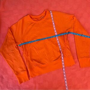 Athleta Sundown Puckered Orange Pullover Crewneck Sweatshirt Size Small